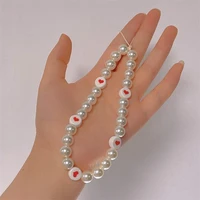 2022 trendy mobile strap phone chain women fashion pearl heart phone charm bracelet anti lost lanyard phone jewelry accessories