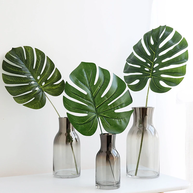 

Artificial Plants Tropical Scattered Monstera Kwai Tree Tail Leaves Home Decor Wedding Birthday Jungle Party Decorations