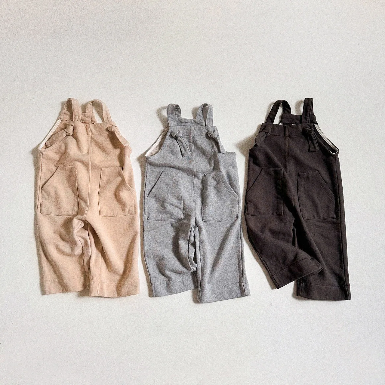 

Spring Autumn Baby Solid Overalls Girl Infant Pockets Loose Suspenders Jumpsuit Boy Baby Cotton Solid Casual Pants Kid Trousers