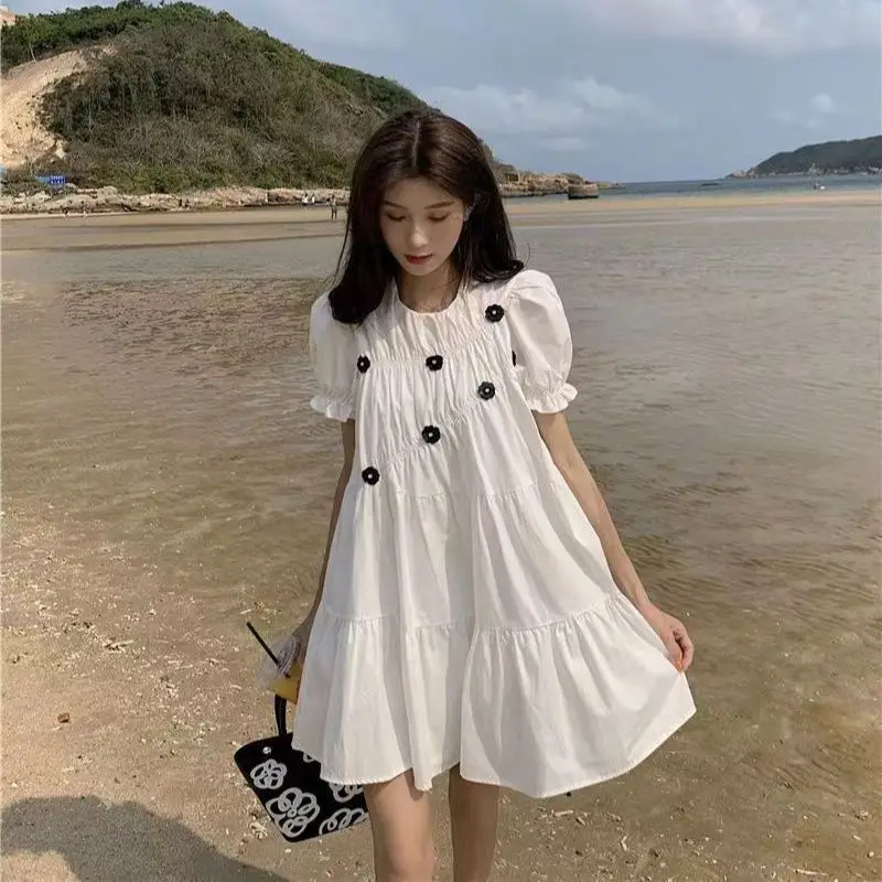 

Summer 2022 New Korean Version Sweet Heavy Industry Bead Piece Flower Bubble Short Sleeve Dress Female Student Loose Skirt