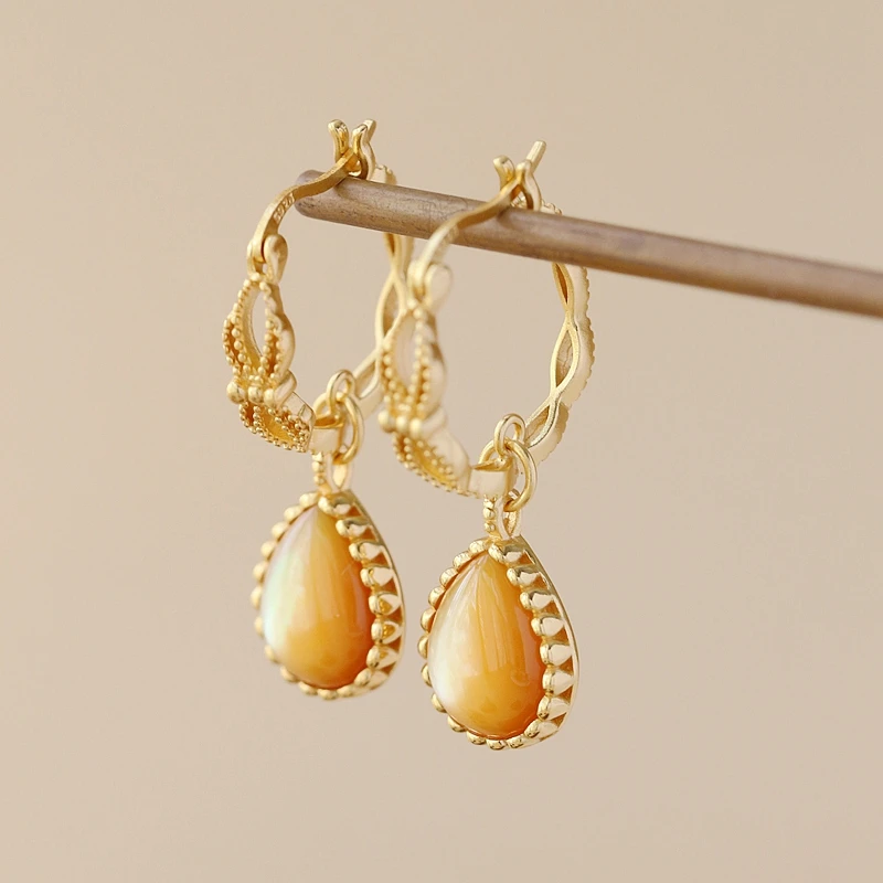 

Серьги из серебра 925 пробы с натуральным золотом и перламутром, 18 К