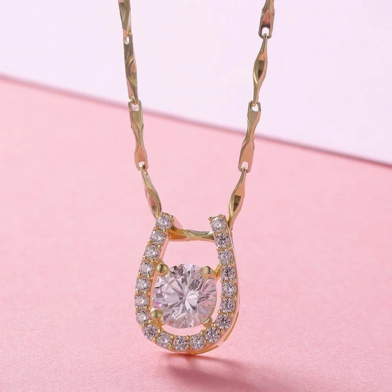 Подвеска в форме подковы из серебра 925 пробы с фианитом золотого цвета | Украшения