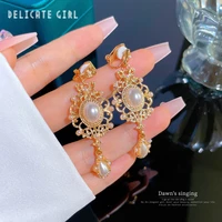 2022 new 925 silver pin fashion luxury elegant sweet cool wind net red pearl design sense of temperament earrings