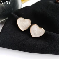 s925 needle sweet heart earrings fashion jewelry metal golden plating enamel white love stud earrings for girl student gifts