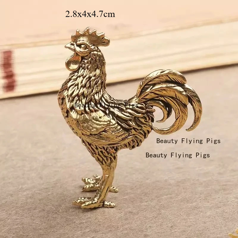 

Латунная статуэтка курица