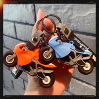 2022 new products creative simple trend motorcycle locomotive key chain car pendant cool net red doll machine jewelry