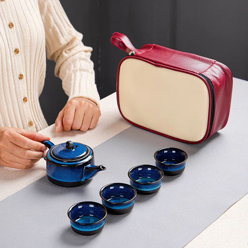 

Керамический дорожный чайный набор гунг-фу, печь Tianmu для обжига глазури, один горшок, четыре чашки, уличный дорожный китайский чайный набор ...