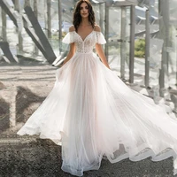 bohemian spaghetti strap tulle wedding dress v neck lace applique backless bride gown a line fairy court train vestidos de novia