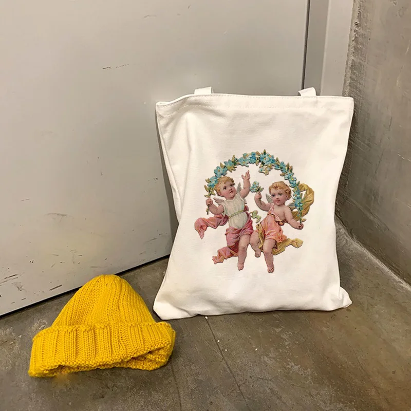 

Новые женские сумки в стиле ретро с крыльями ангела для маленьких мальчиков и девочек эротические Мультяшные принты с буквами Harajuku Ulzzang хол...