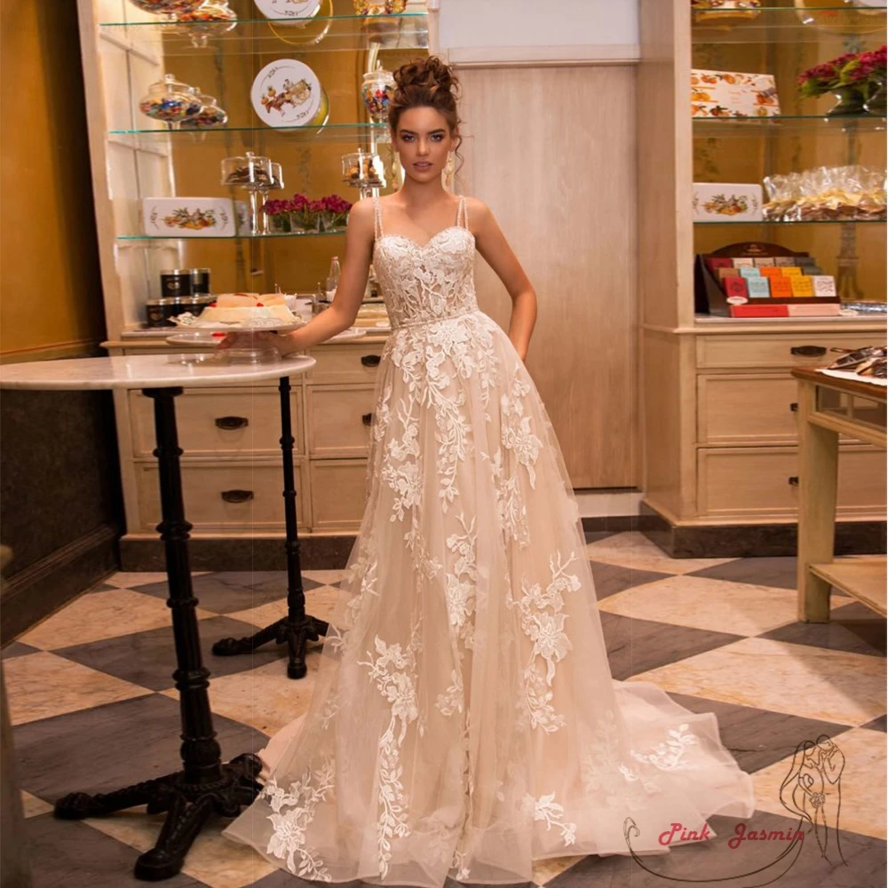

Spaghetti Strap Beach Wedding Dresses for Women 2023 Sweep Train Applique Sleeveless Button Bridal Gowns Vestidos De Novia New