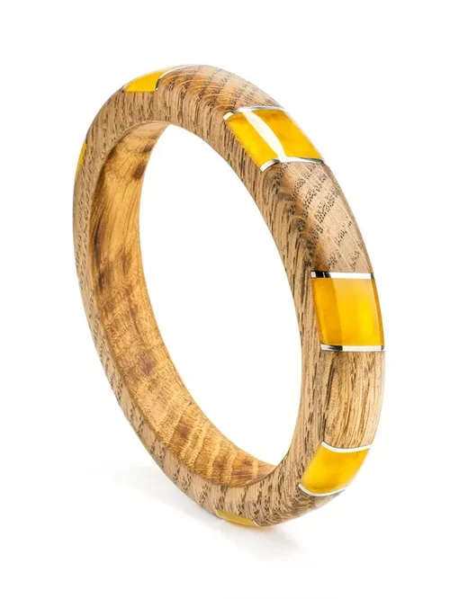 Оригинальный цельный браслет Индонезия из дерева и янтаря украшенный серебром |