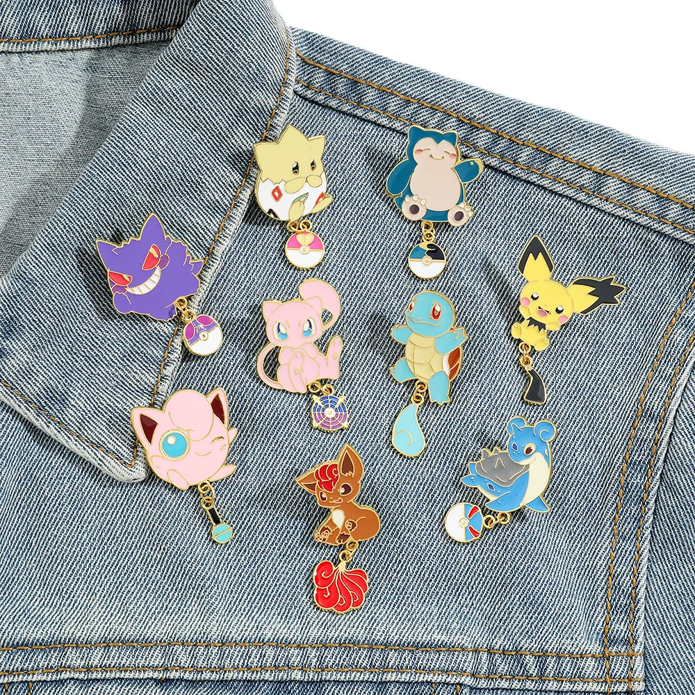 Фото Булавки-подвески с покемонами Jigglypuff Gengar Vulpix Mew Lapras Pichu Squirtle Togepi Snorlax с хвостом и PokeBall Броши Подарки для фанатов №1