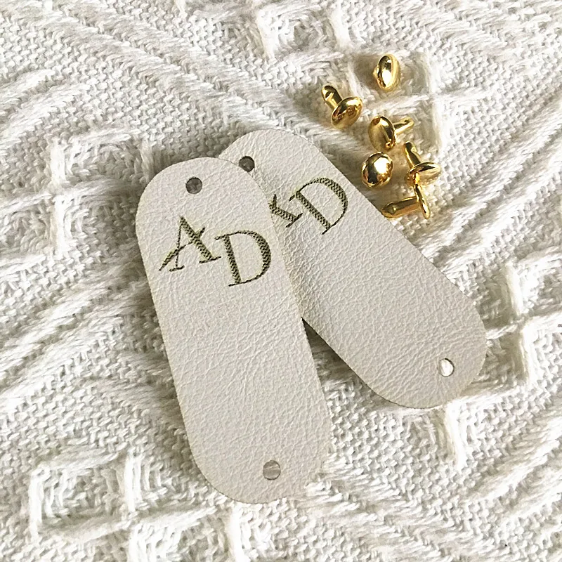 

30pcs Knitting labels with rivets Custom Handmade logo leather tags for clothes Personalized sewing center fold crochet label