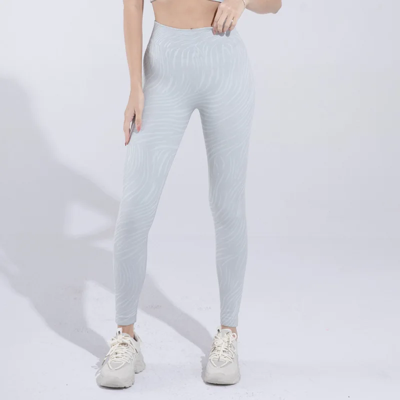 Женские спортивные легинсы LMTD