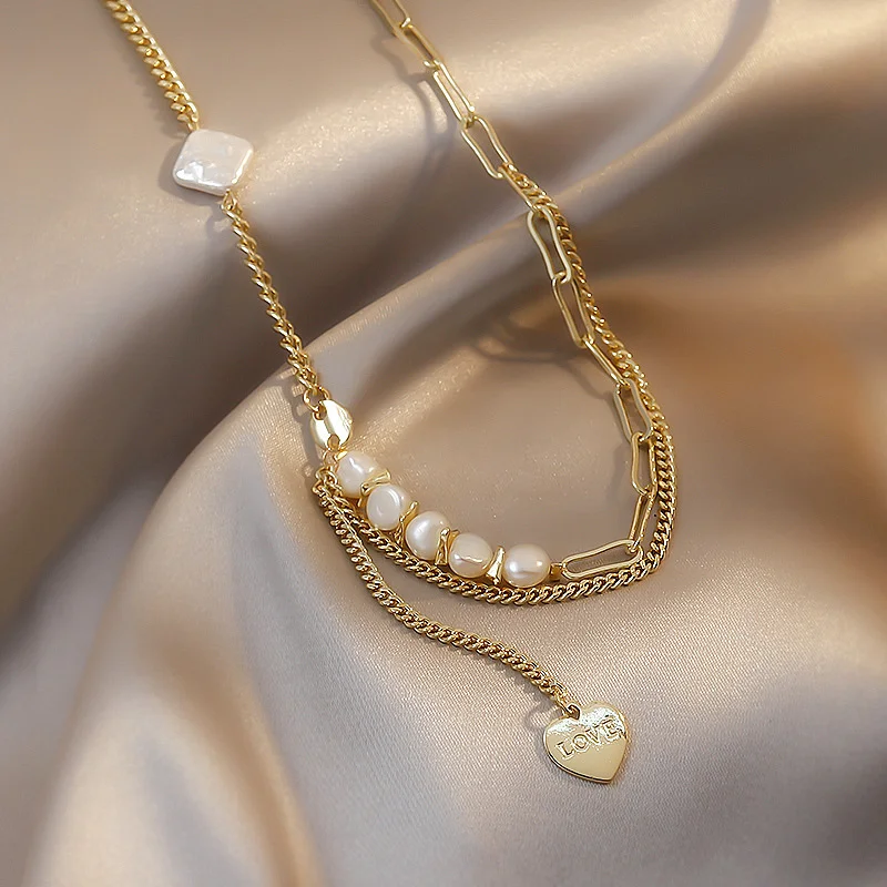 

Collarbone Chain Asymmetric Metal Imitation Pearl Cardioid Type Necklace Fashion Design Sense Jewelry Accessories