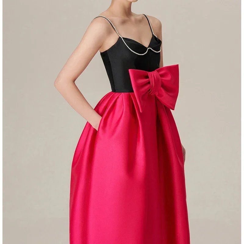 Розово-красное элегантное платье женское с бриллиантами и большим бантом