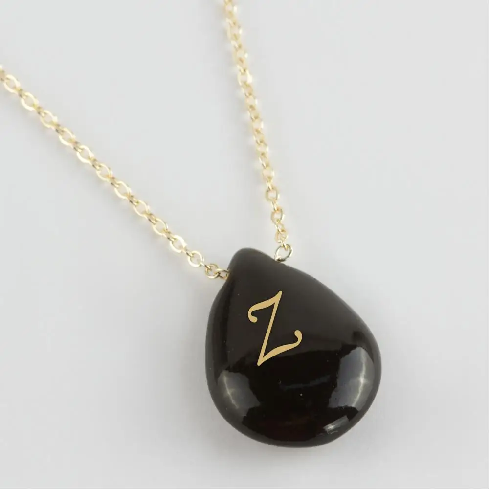 

Turquoise (Black Color) Letter Necklace