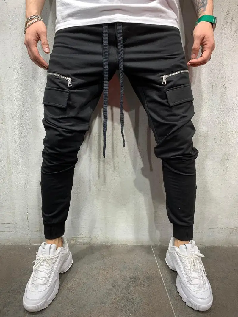 

Spring and autumn new casual fashion men multi zipper pure color versatile casual pants sport pants