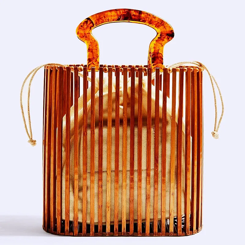 INS Hot Selling Woven Women's Handbag In Europe and America Fashion Beach Grass Woven Bag Simple Acrylic Handheld Bamboo Package