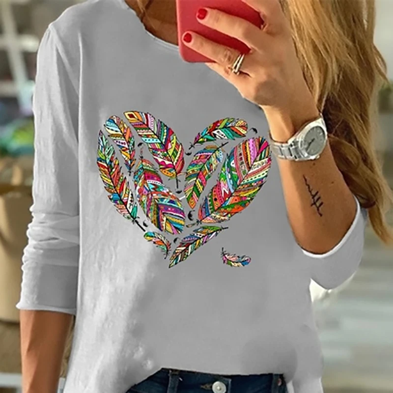 

Женская блузка с круглым вырезом, длинным рукавом и перьями