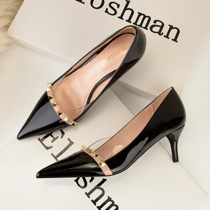 

Sexy thin transparent high heels stiletto high heels patent leather shallow pointed toe metal rivet single shoes