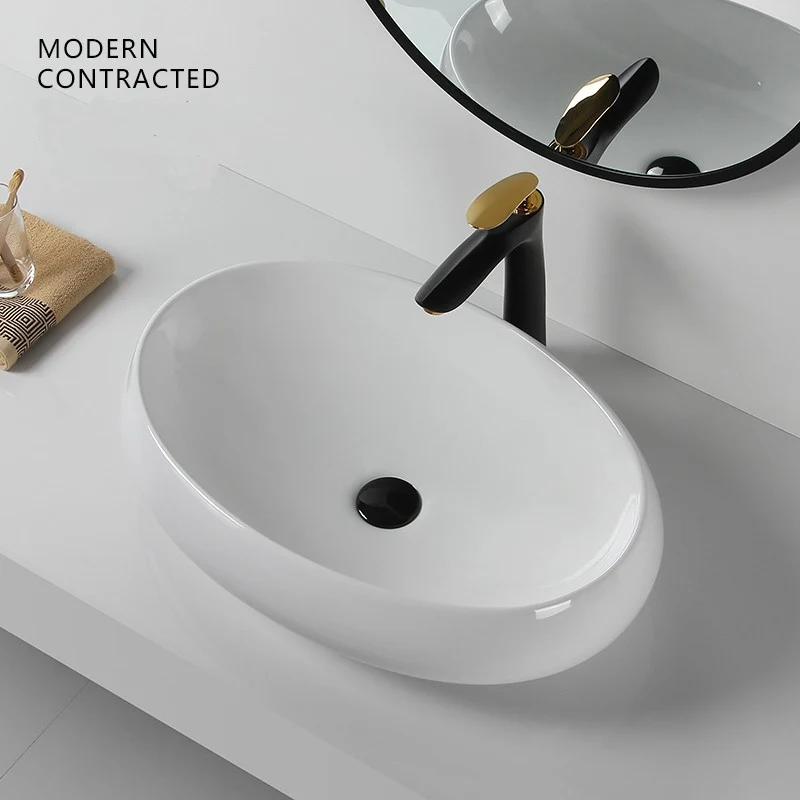 

Simple Countertop Basin Oval Bathroom Washbasin Ceramic Washbasin Balcony Washbasin Narrow Home Art Basin 610*410*150mm