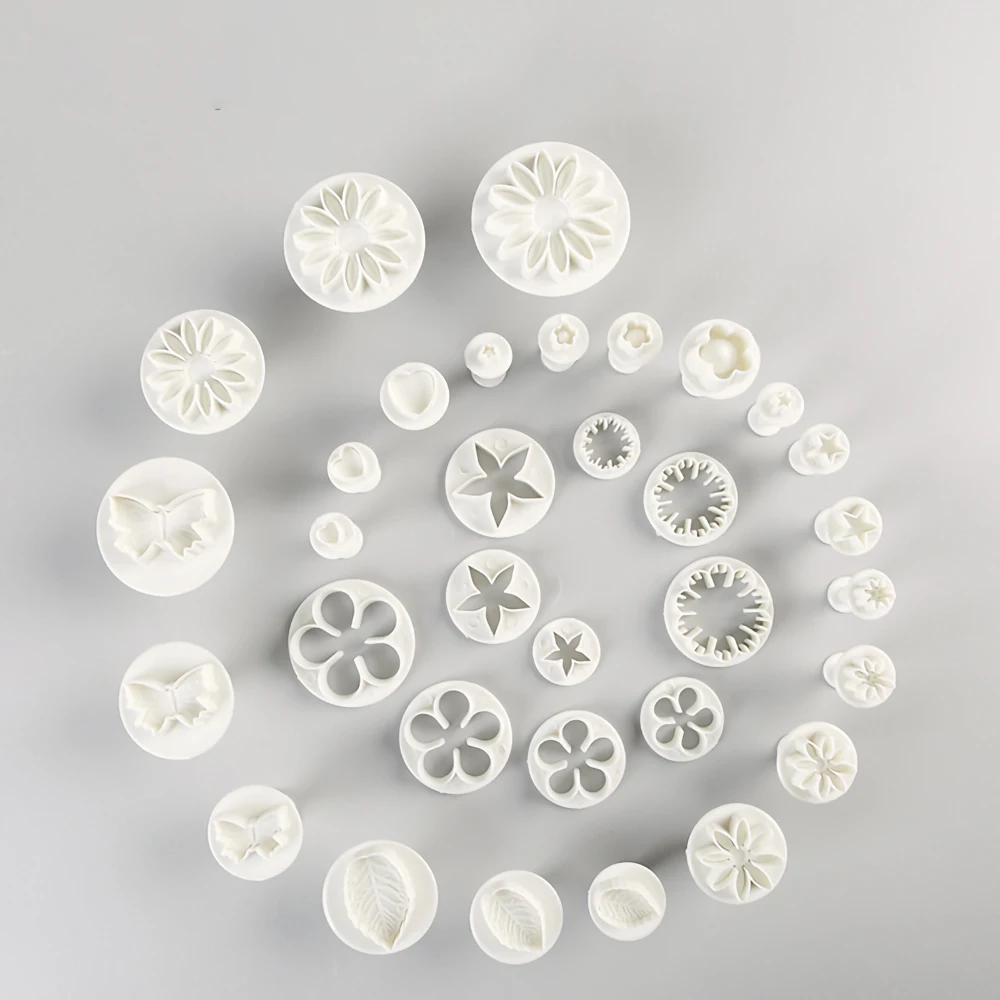 

33pcsPottery art plastic printing mold, flowers, stars, butterflies shapes DIY With spring clay printing tools clay mold
