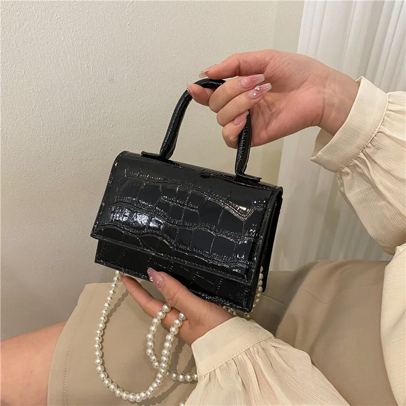

Advanced sense of small bags 2022 new bags women's summer Joker Pearl chain bag messenger bag portable small square bag