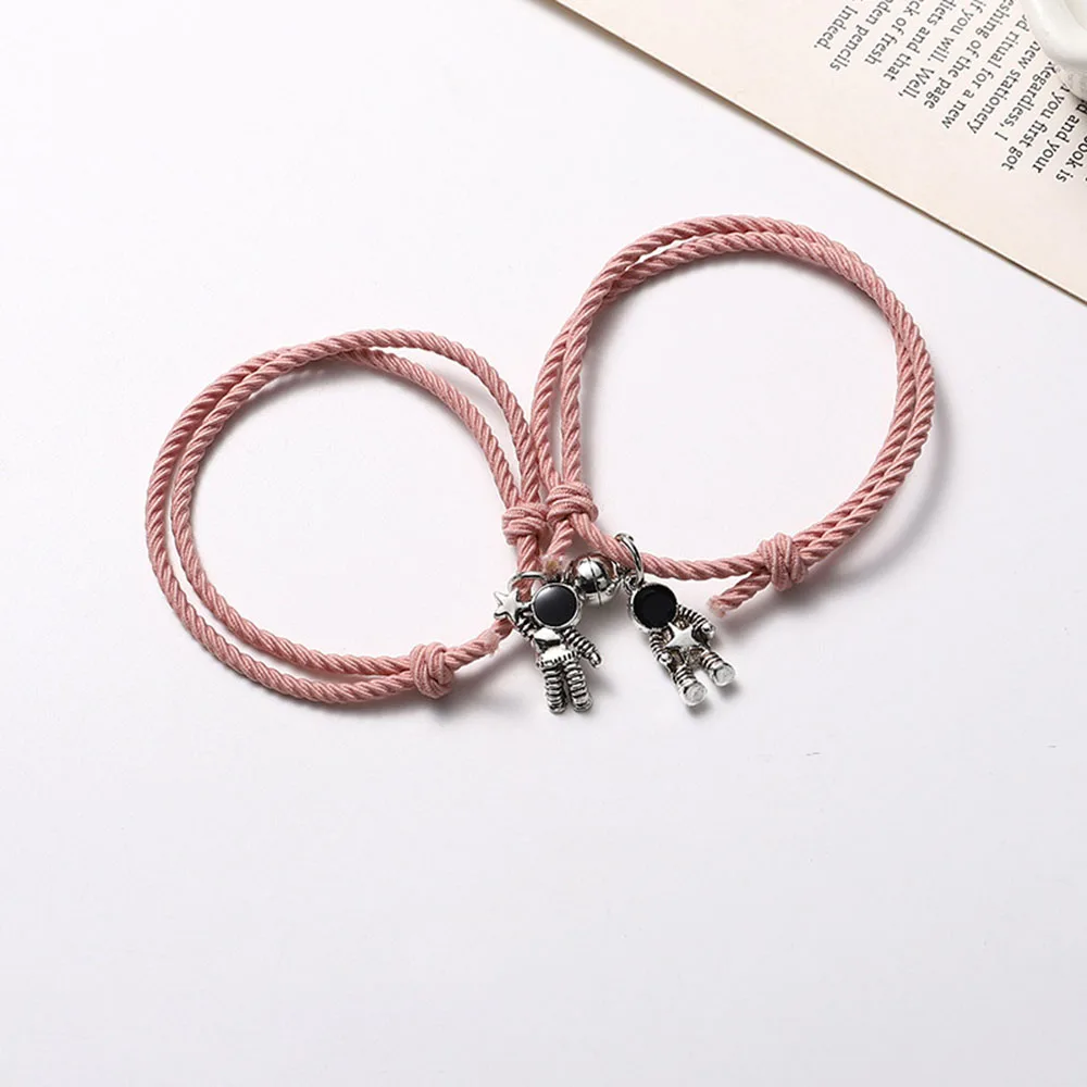 

Couple Bracelet Charm Astronaut Small Rubber Band To Send Girlfriend Boyfriend Magnet Stone Bell Bracelet Knot Head Rope Jewelry