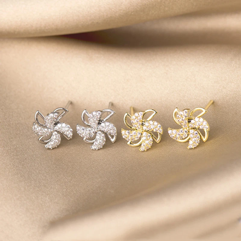 

Women Simple Korean Ear Jewelry Vintage Rotatable Windmill Stud Earrings