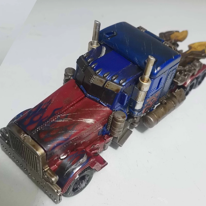 

Transformation Toys Optimus Deformation Robot SS05 6022A Battle Damage Action Figure OP Commander Anime Alloy Car Model Gift
