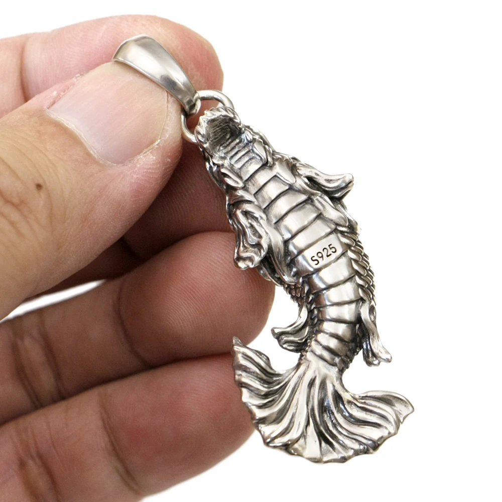 _ Серебряная подвеска в виде рыбки с изображением дракона что означает Улучшение
