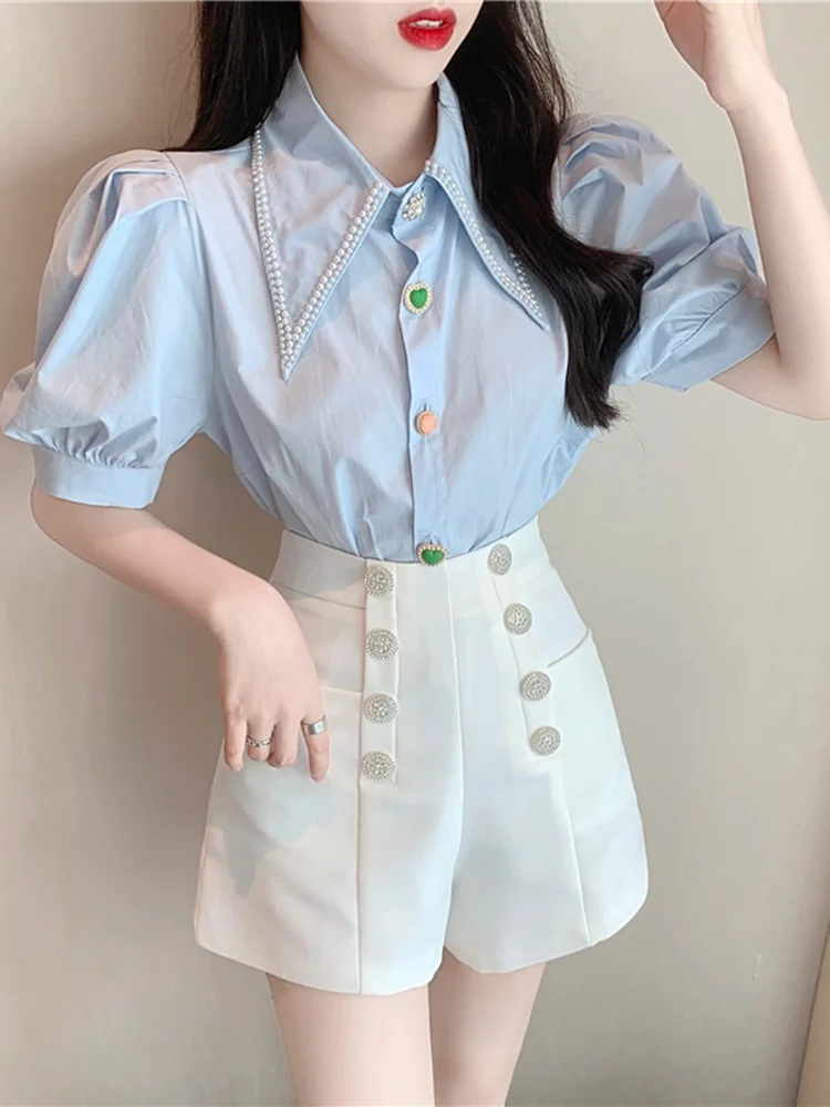 

Женская летняя рубашка с буффами на пуговицах и рукавах