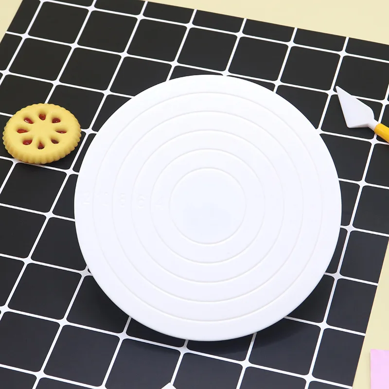 

Пластиковый поворотный стол для торта