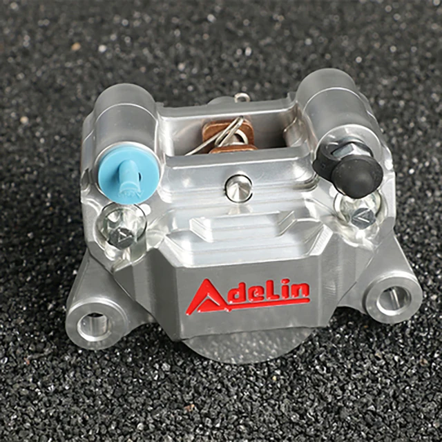 

Adelin ADL 28 Кованый алюминиевый гоночный мотоцикл 34 мм Поршень Задний дисковый тормозной суппорт 84 мм для MSX125 NIU N1 BWS RS100 GTR M3