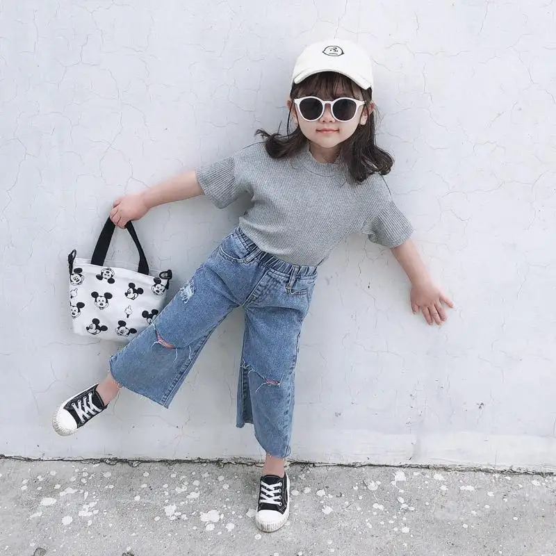 

2013 Spring Kids Clothes Loose Girls Ripped Jeans Solid Girls Pants Denim Girls Pants High Waist Solid Jeans Children's Clothing