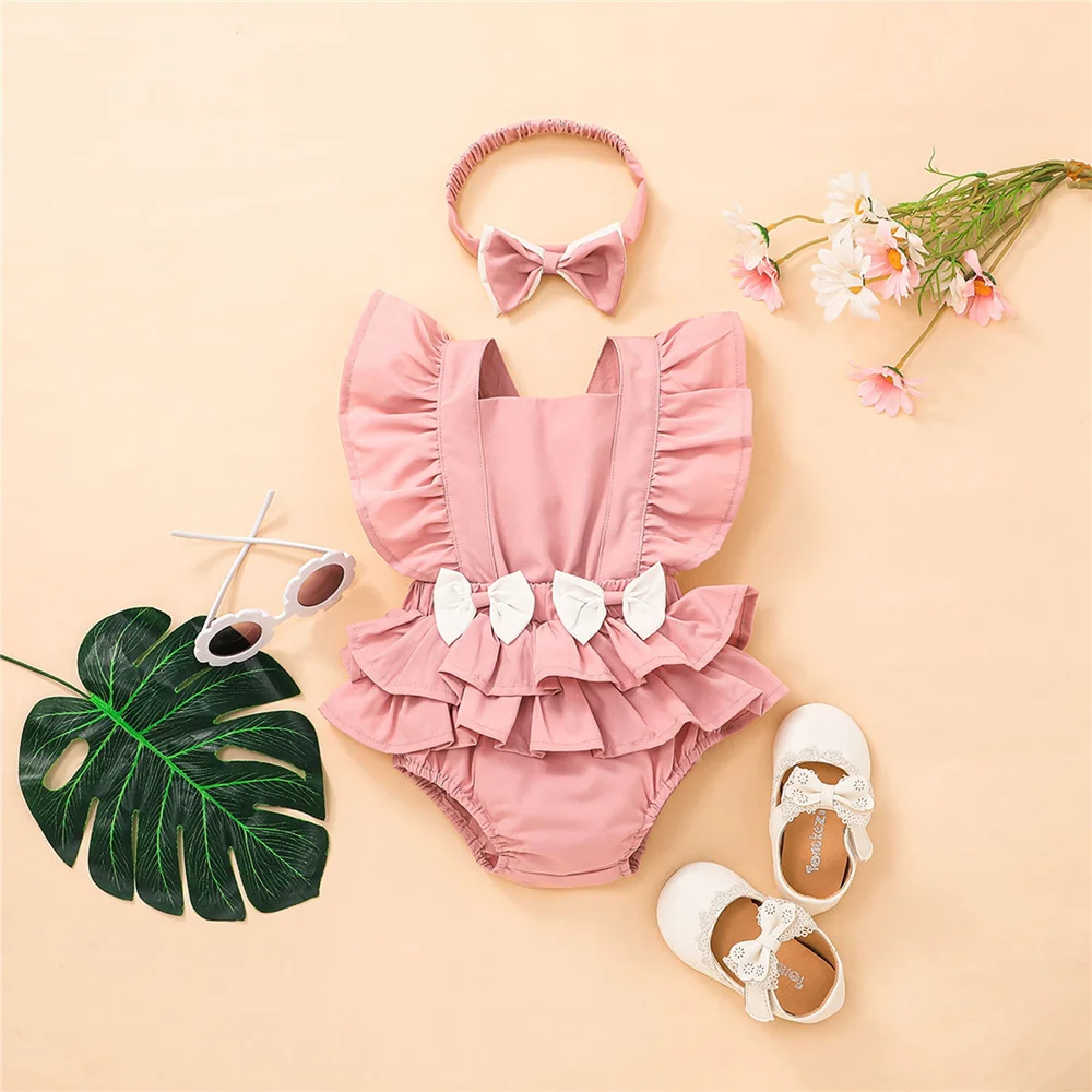 

Newborn Baby Girl Summer Cute Pink Romper Toddler Kids Solid Color Ruffled Short Sleeve Bodysuit And Bow Headband 2022