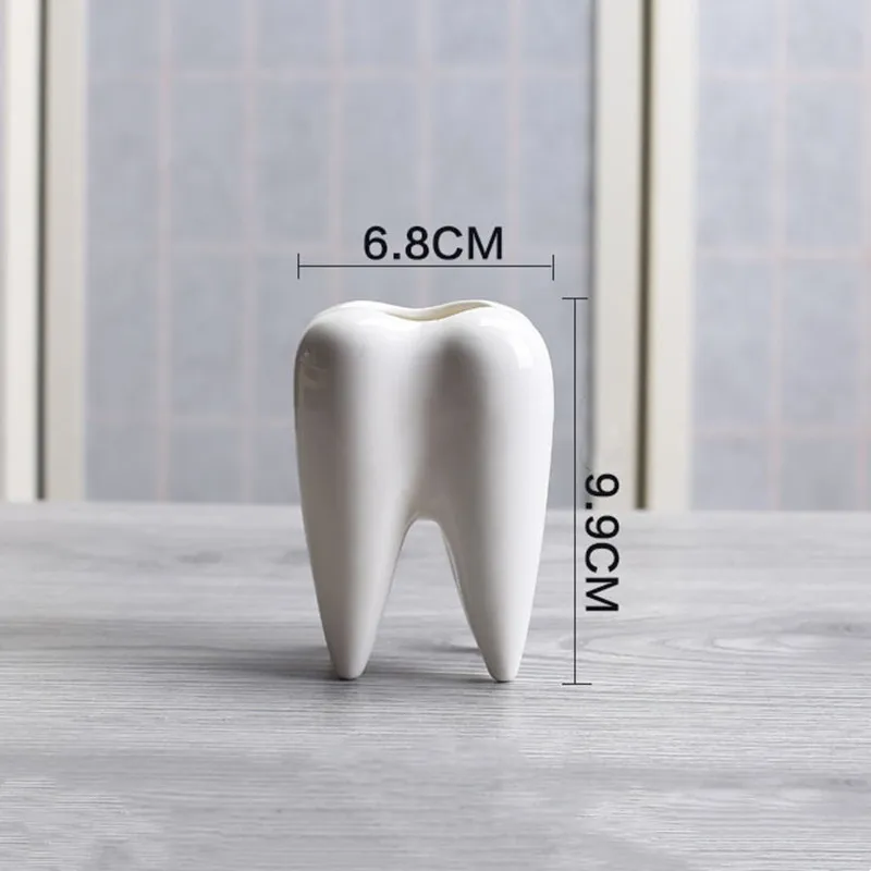 

Керамический цветочный горшок в форме зуба