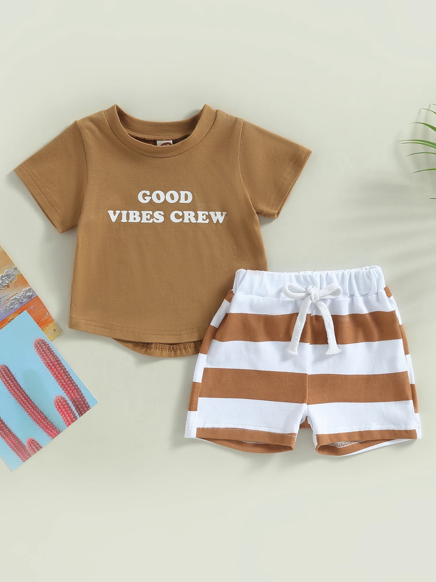 

Детский комбинезон для девочек с цветочным принтом