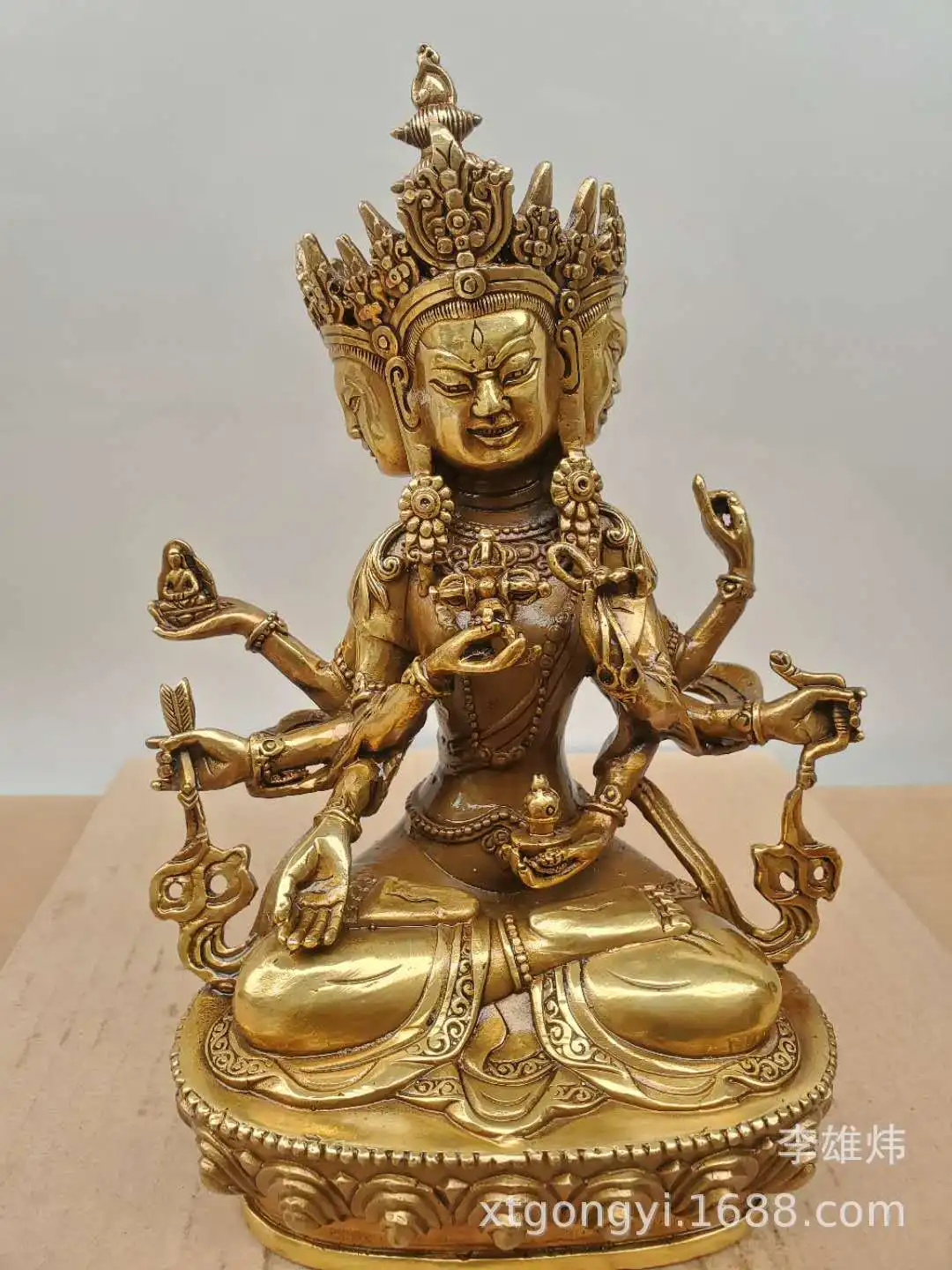 

Seven-inch bronze statue of Victory Buddha mother three heads and eight arms Tantric Buddha statue wholesale