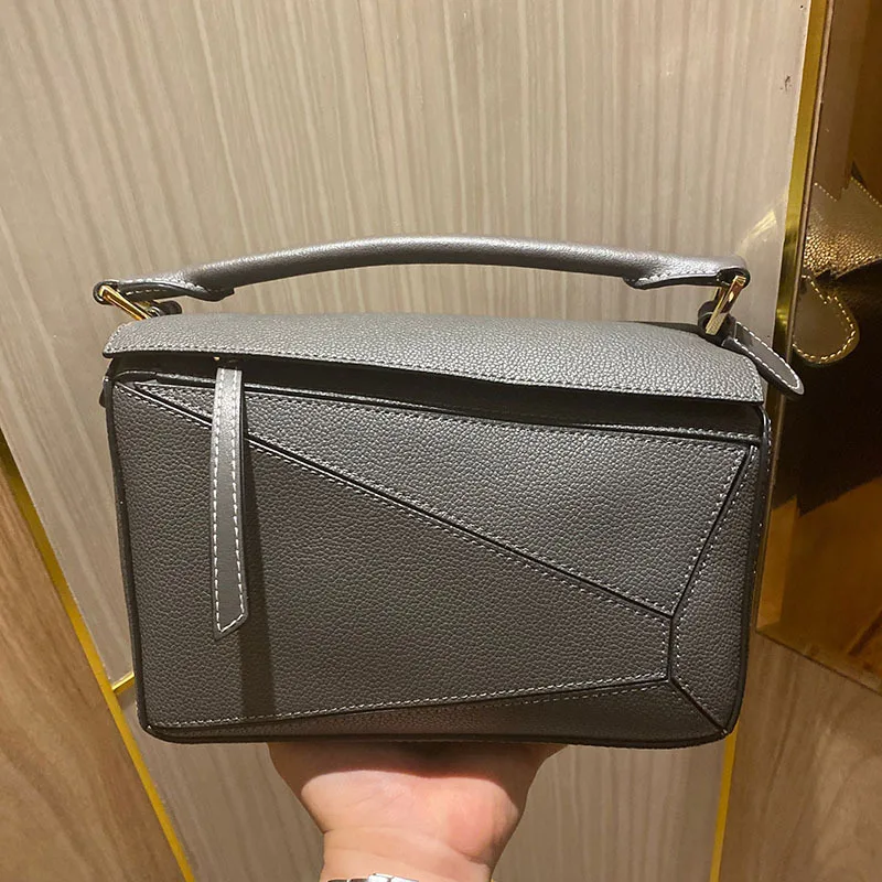 2023 Designer Luxury genuine Leather Large Capacity Single Shoulder Oblique Span Portable Color Bump Puzzle Bag Purse Handbags