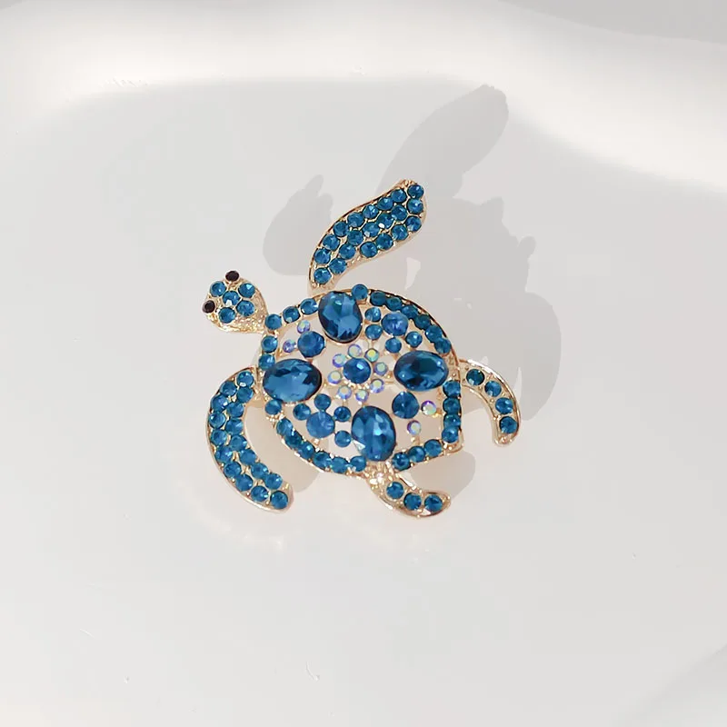 Хрустальная брошь черепаха золотистого цвета