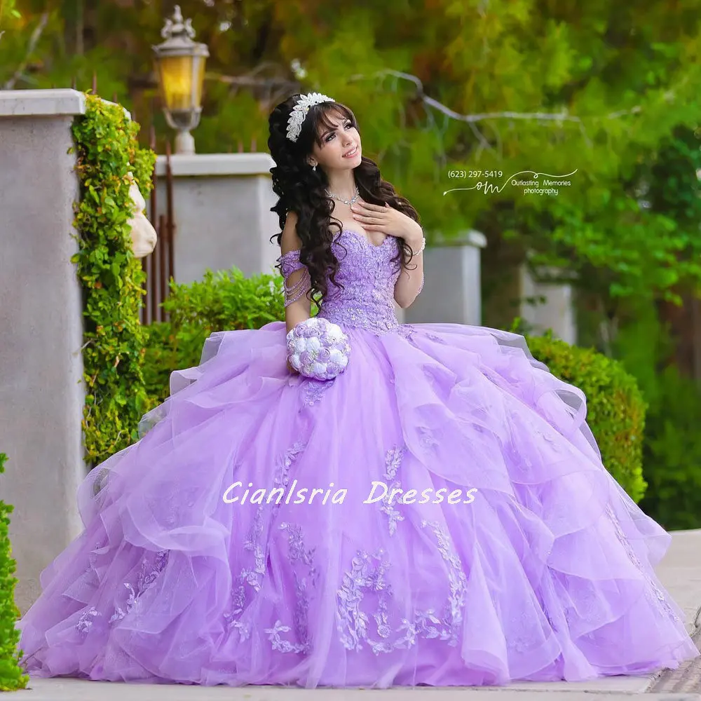 

Lilac Beading Tassel Ruffles Quinceanera Dress Ball Gown Off The Shoulder Appliques Lace Corset Sweet 15 Vestidos De Quinceañera