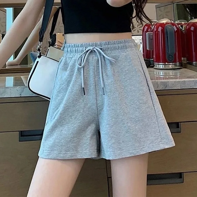 

Fashion 2022 New Korean Design Cheap Sports Women'S Drawstring Loose Thin Wide Leg Solid Color Casual Short Pants Summer Shorts