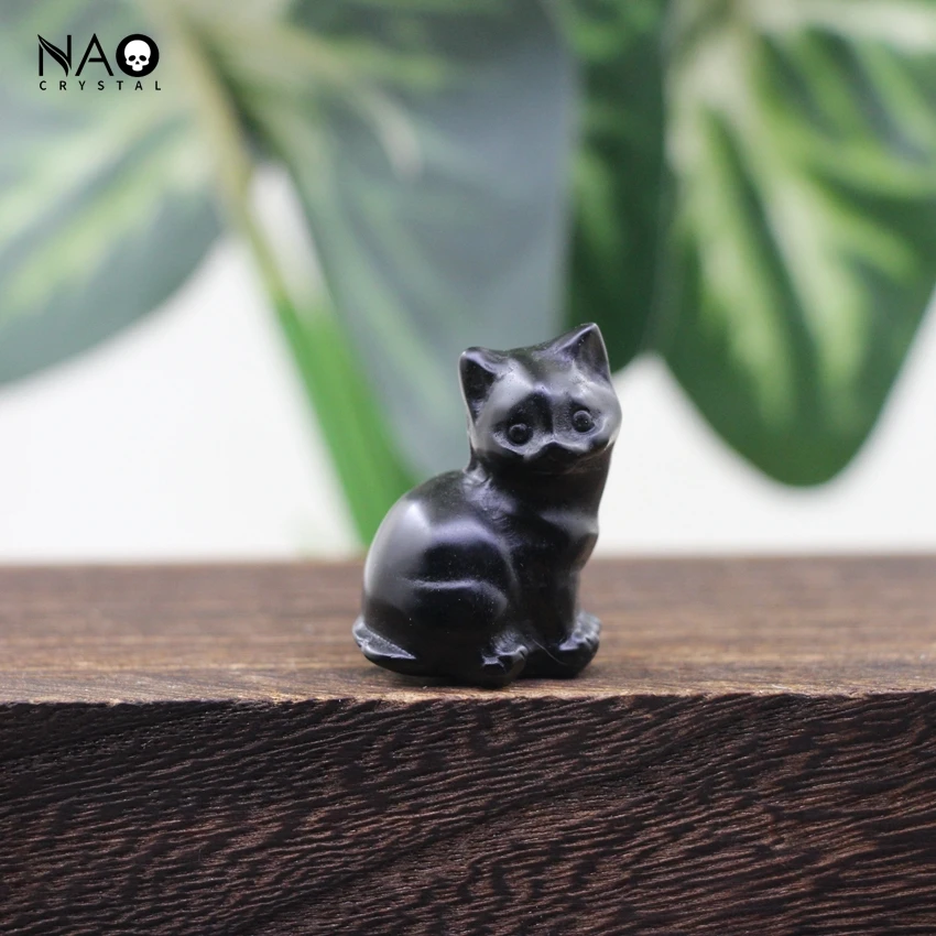 

Фигурки из камня кошки