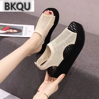 2022 summer new flying woven sandals thick soled mesh flat bottomed sports sandals open toe leisure vacation beach sandals