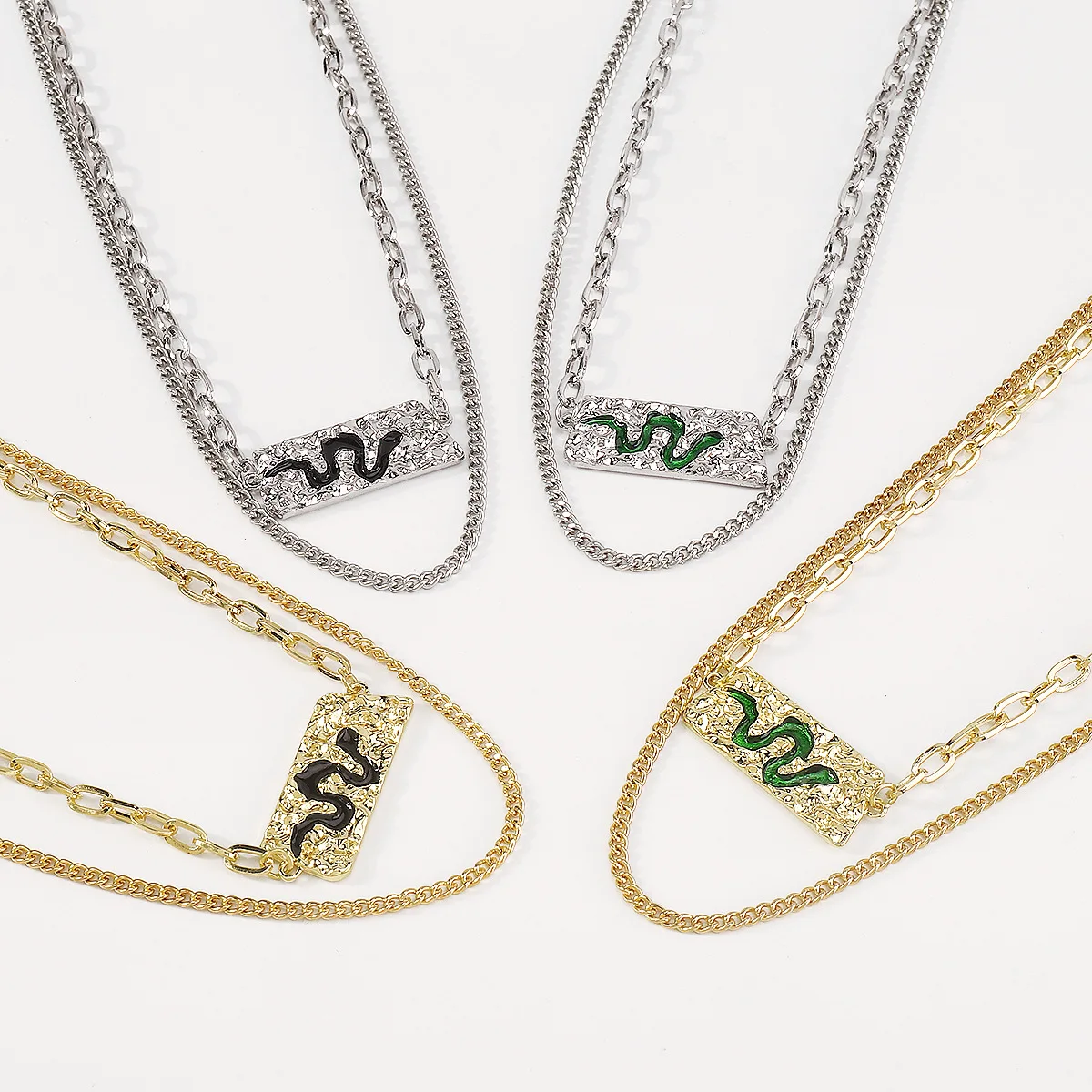 Accessories: Layered with a statement snake element necklace, exaggerated hip-hop punk style necklace