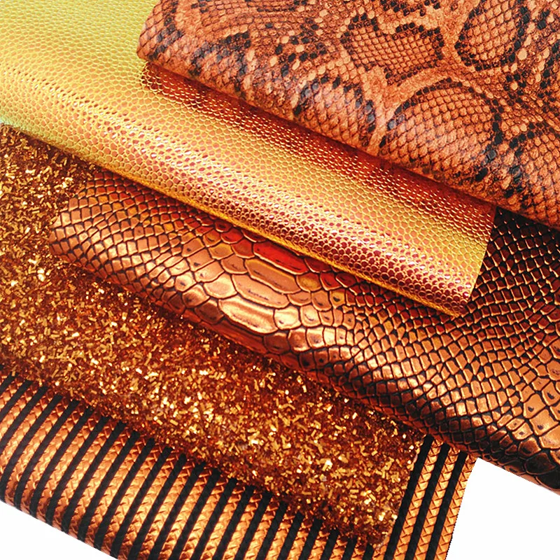 Оранжевые блестящие кожаные листы полосы змея кавира рельефные из синтетической