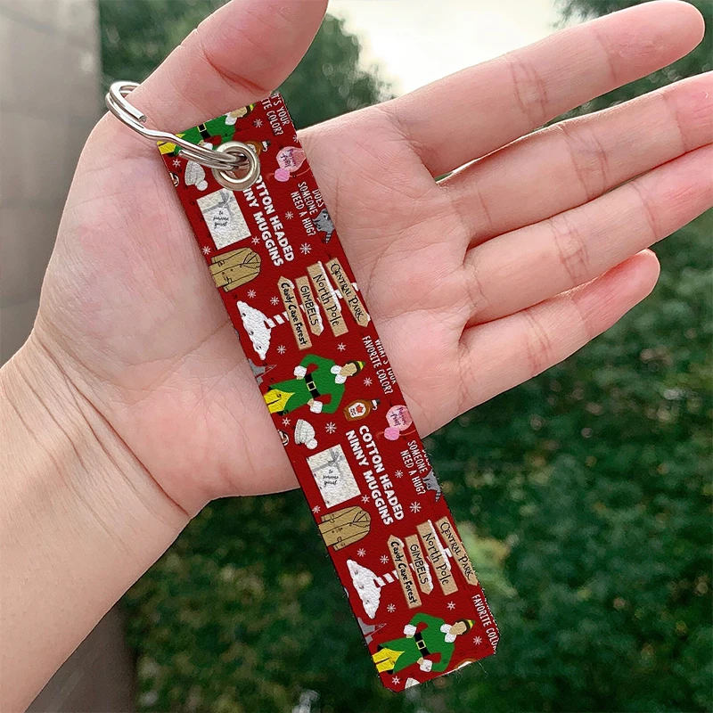 

Fashion Buddy the Elf collage Red background Keychain Strap Keyrings Hanging Holder Bag Car Wallet Trinket Keychain Hanging