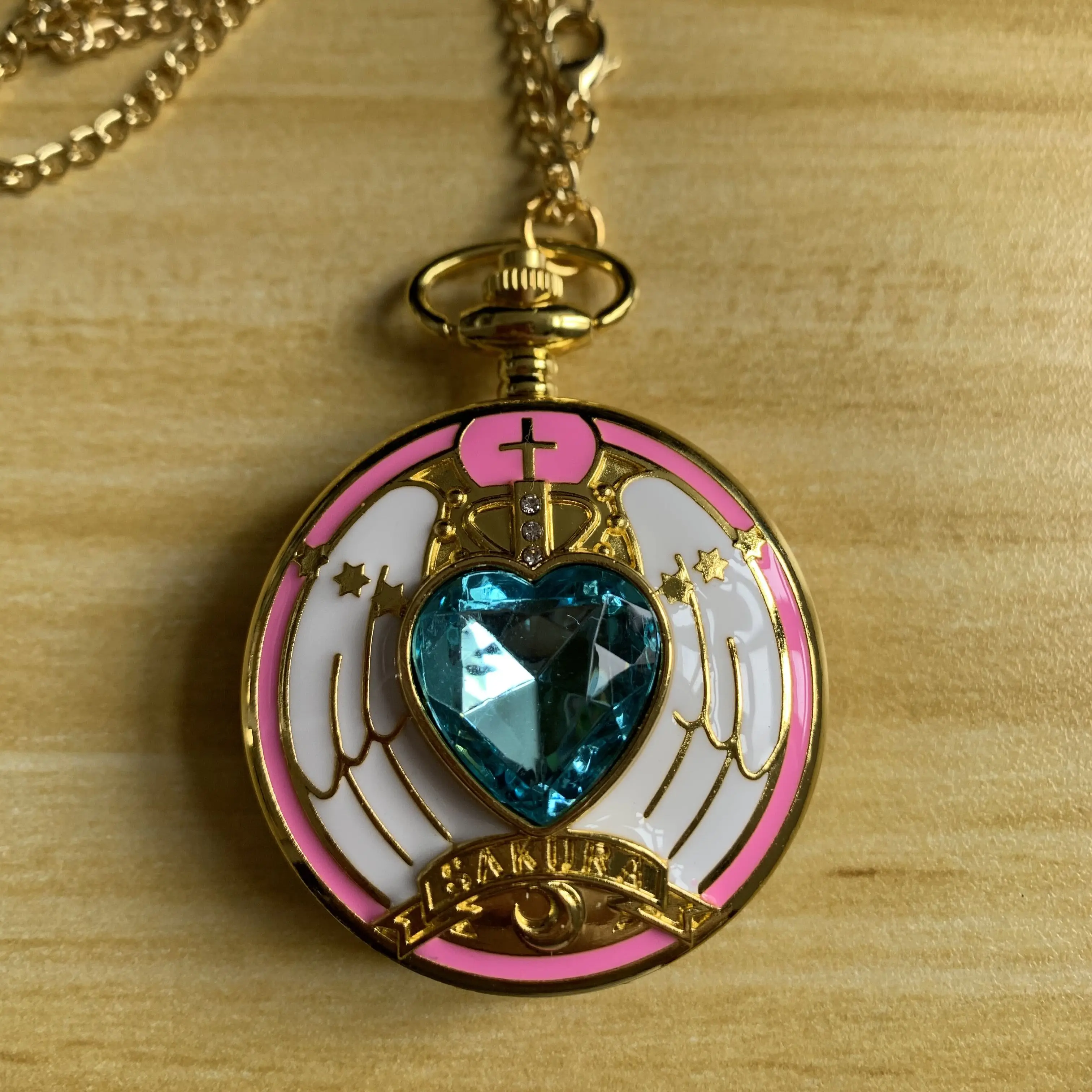 

Японские Аниме золотые карманные часы ожерелье Звезда драгоценный камень синяя подвеска цепочка часы женские Волшебные часы подарок для девочек